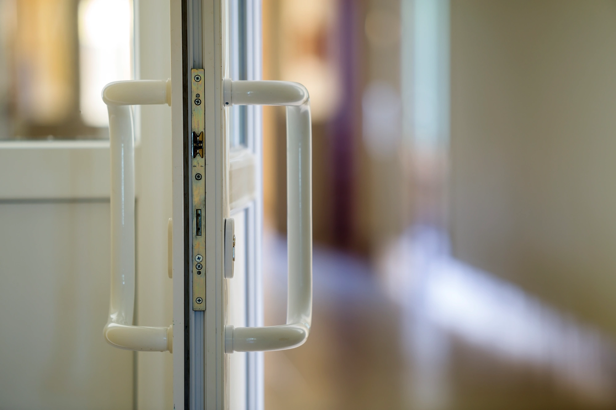 white-doorway-opens-into-blurred-interior-space-2026-09-23-06-09-17-utc